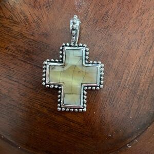 Premier Designs reversible cross pendant enhancer.
